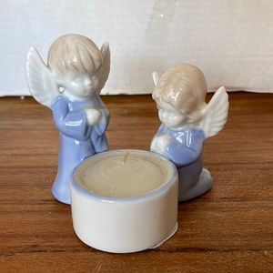 Praying Angels candle holder figurines.